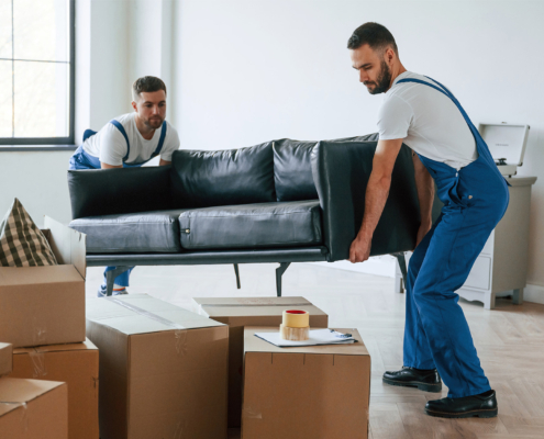 Workers moving couch
