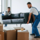 Workers moving couch