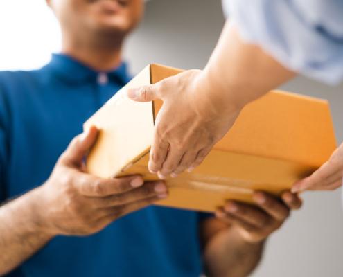 Worker delivering box