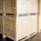 interior of storage warehouse, large shipment crate wooden pallet